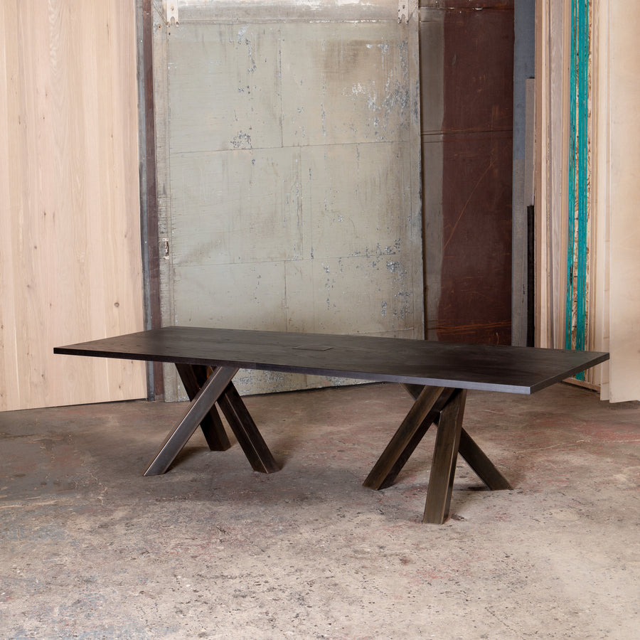 dark criss-cross leg dining table