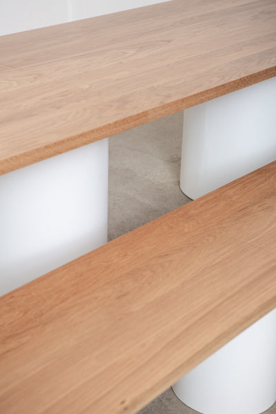 long modern dining table and bench (detail)