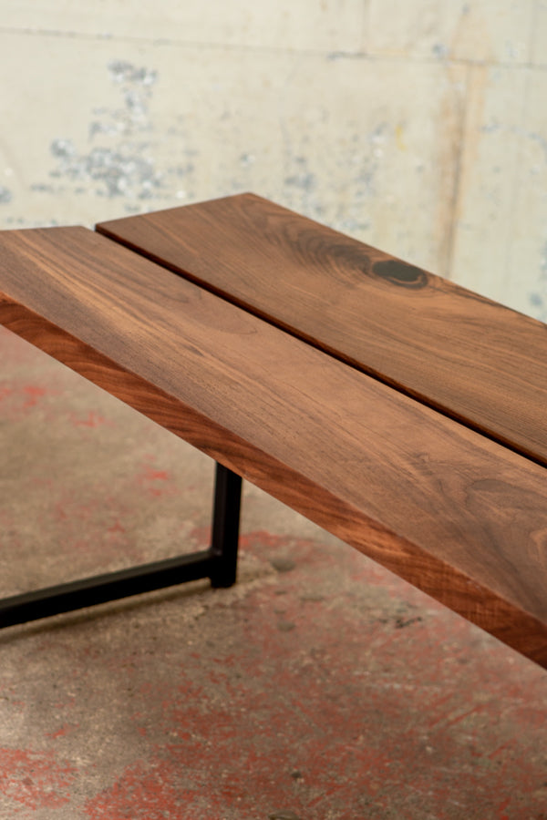 angled wooden seat of bench