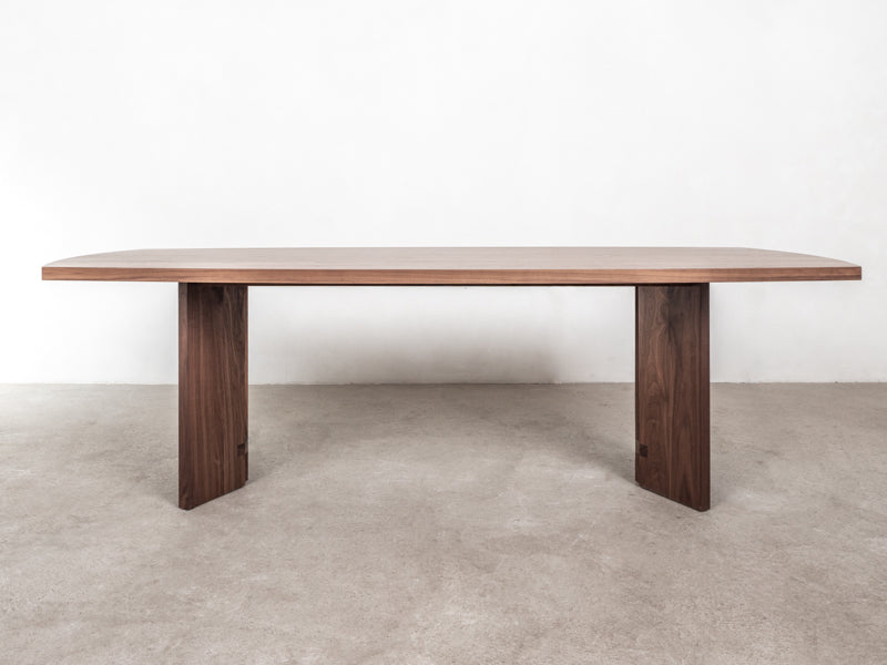 natural wood dining table in walnut