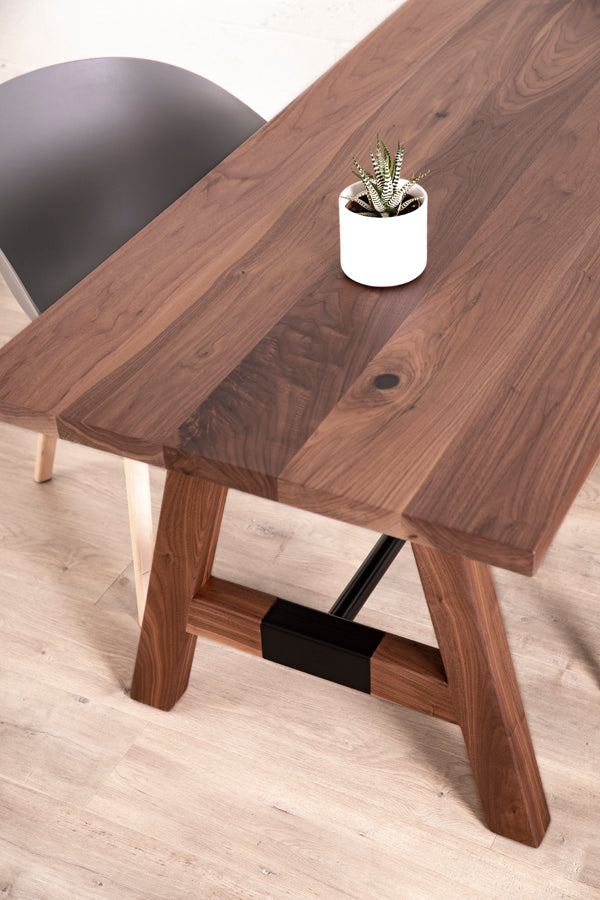 solid wood dining table in walnut