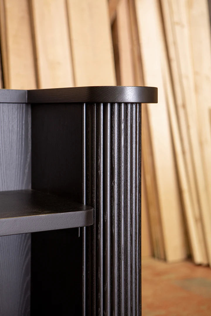 modern reception desk in dark wood