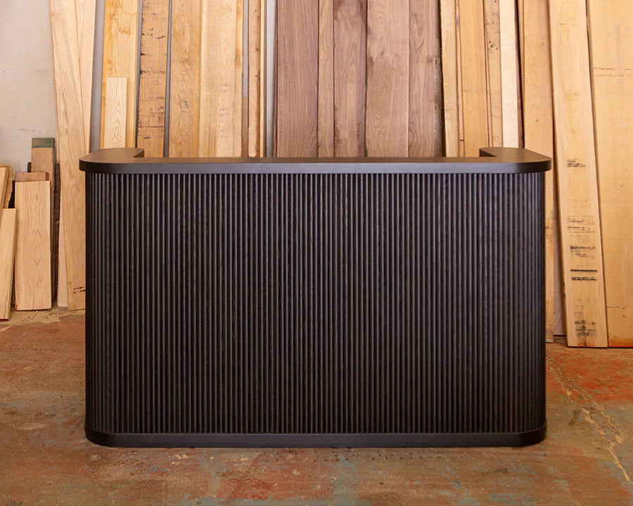 reception desk in oxidized oak